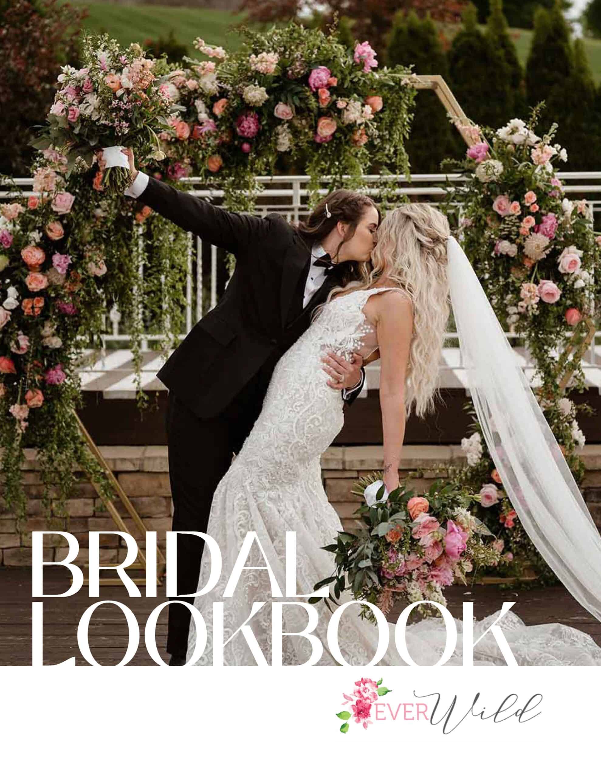 Cover of EverWild Bridal Lookbook, showing a newly married couple sharing a kiss under a wedding arch with floral decorations.